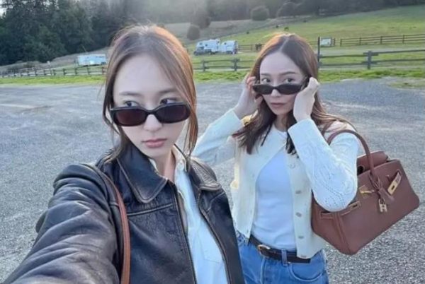 郑秀妍郑秀晶姐妹久违亮相，墨镜造型同框引网友热议 